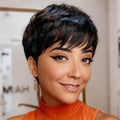 Woman with short black hair wearing an orange turtleneck sweater, Obroi