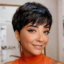 Woman with short black hair wearing an orange turtleneck sweater, Obroi