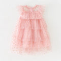 Pink polka dot dress on a white background, Obroi