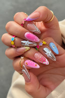 Close-up of a hand with colorful and decorative nails, Obroi