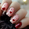 Nails with red heart and glitter design on a blurred background, Obroi