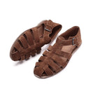 Pair of brown sandals with woven straps on a white background, Obroi