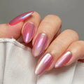 Nails with a pink and purple gradient on a neutral background, Obroi