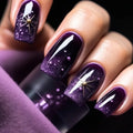 Close-up of a hand with purple glittery nails and decorative elements, Obroi