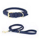 Navy blue braided dog collar and leash set on a white background, Obroi
