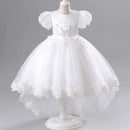 White flower girl dress on a mannequin against a gray background, Obroi