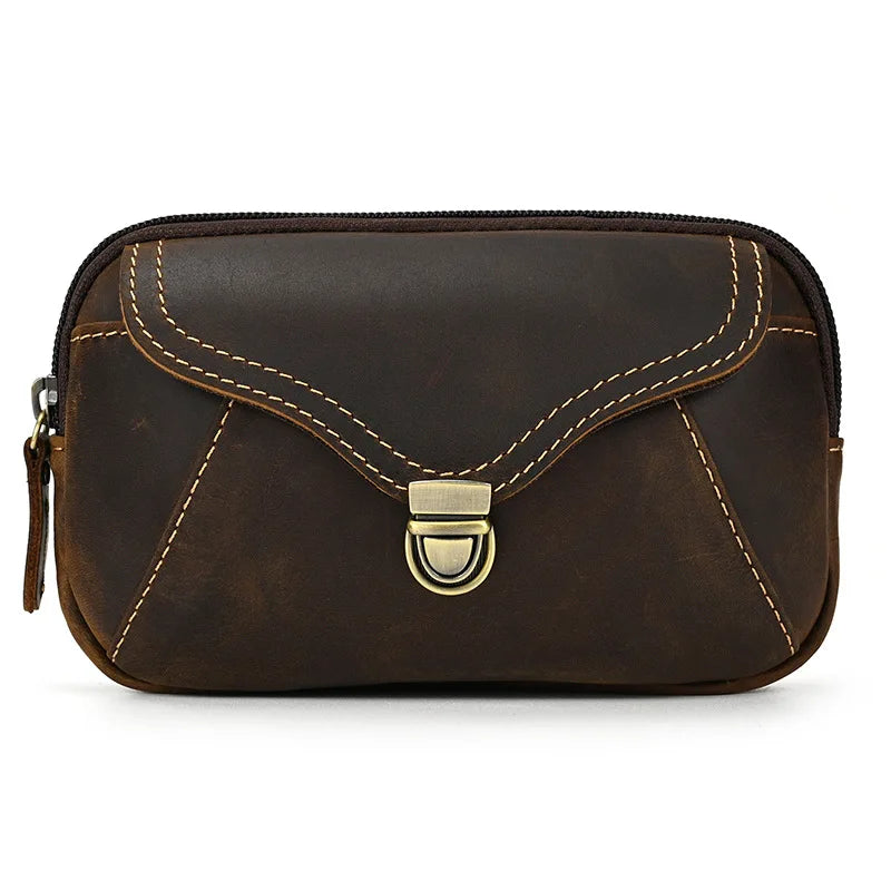 Obroi Brown leather pouch with gold accents on a white background