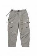 Gray cargo pants with multiple pockets and zippers on a white background, Obroi
