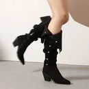 Black knee-high boots with decorative bows and buttons on a neutral background, Obroi