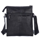 Obroi Black leather crossbody bag on a white background