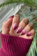Close-up of a hand with pink and purple gradient nails, Obroi