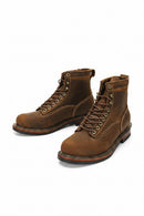 Pair of brown leather boots on a white background, Obroi