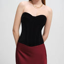 Black strapless top and red skirt on a plain background, Obroi
