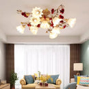 Decorative ceiling light fixture in a living room setting with a couch and lamp, Obroi