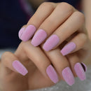 Close-up of hands with pink textured nail polish on a blurred background ,Obroi