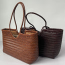 Two woven bags, one brown and one black, on a light gray background, Obroi