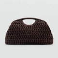 Brown woven handbag on a light gray background, Obroi