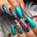 Colorful feather nail art on a hand with a blurred background, Obroi