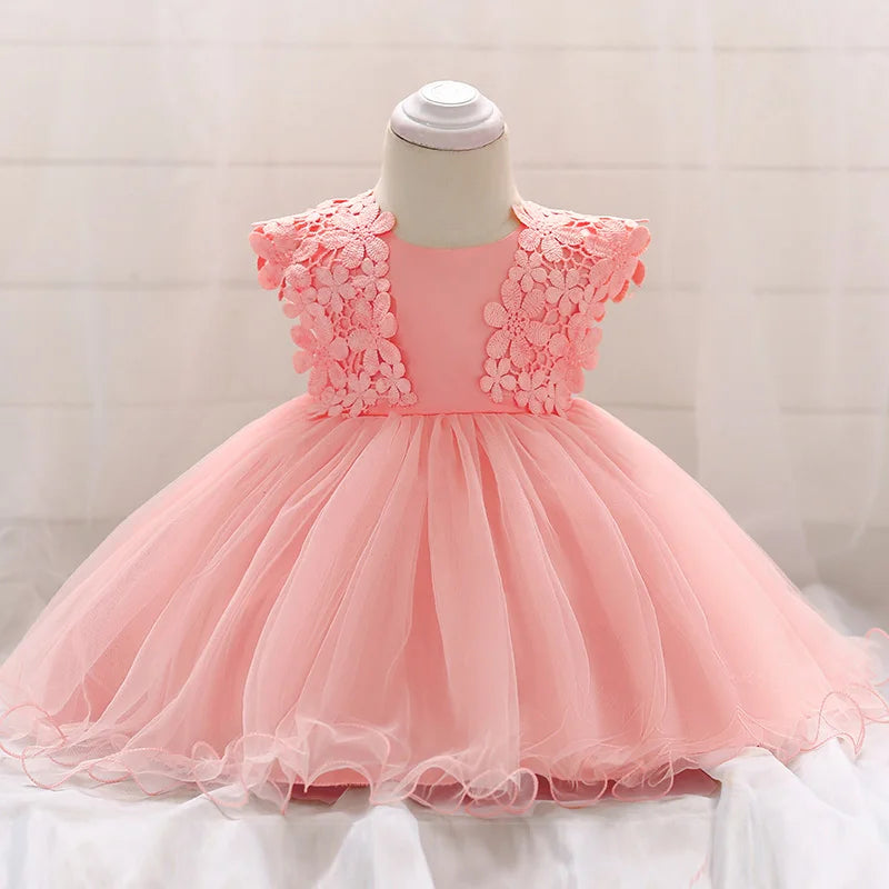 Obroi Pink floral dress on a mannequin against a plain background