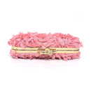 Pink floral clutch with gold trim on a white background, Obroi
