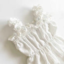 White lace dress on a light background, Obroi