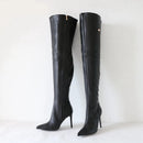 Black knee-high boots with high heels on a white background, branded 'Obroi'