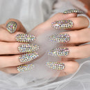 Nails with rhinestone decorations on a neutral background, Obroi