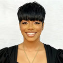 Woman with a short black hairstyle wearing a black top and gold necklace on a white background, Obroi