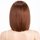Back view of a person with straight brown hair on a white background, Obroi