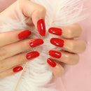 Hand with red nail polish on a soft pink background, Obroi