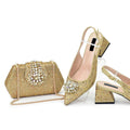 Gold glittery high-heeled shoes and matching handbag on a white background, Obroi
