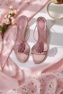 Pink sandals with gemstones on a pink fabric background, Obroi