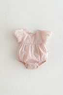 Pink baby romper with ruffled sleeves on a light gray background, Obroi