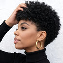 Woman with styled hair wearing a black turtleneck against a white background, Obroi