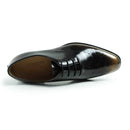 Black dress shoe with brown sole on a white background, Obroi
