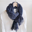 Navy blue scarf draped over a mannequin against a white background, Obroi