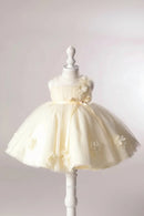 Cream-colored dress with floral details on a mannequin against a plain background, Obroi