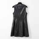 Black leather dress on a hanger against a white background, Obroi