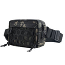 A tactical waist bag with a black and dark green camouflage pattern, featuring a prominent black honeycomb front panel, zippered compartments, and an adjustable black webbing strap with a quick-release buckle, Obroi