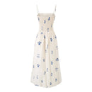 Obroi Beige dress with blue floral patterns on a white background