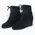 Black wedge boots with laces on a white background, branded 'Obroi'.