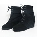 Black wedge boots with laces on a white background, branded 'Obroi'.