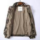 Camouflage jacket with a visible brand label on a white background, Obroi