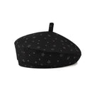 Black beret with star pattern on a white background, Obroi