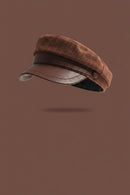 Brown cap on a brown background, Obroi