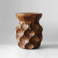 Wooden side table with wavy design on a gray background, Obroi