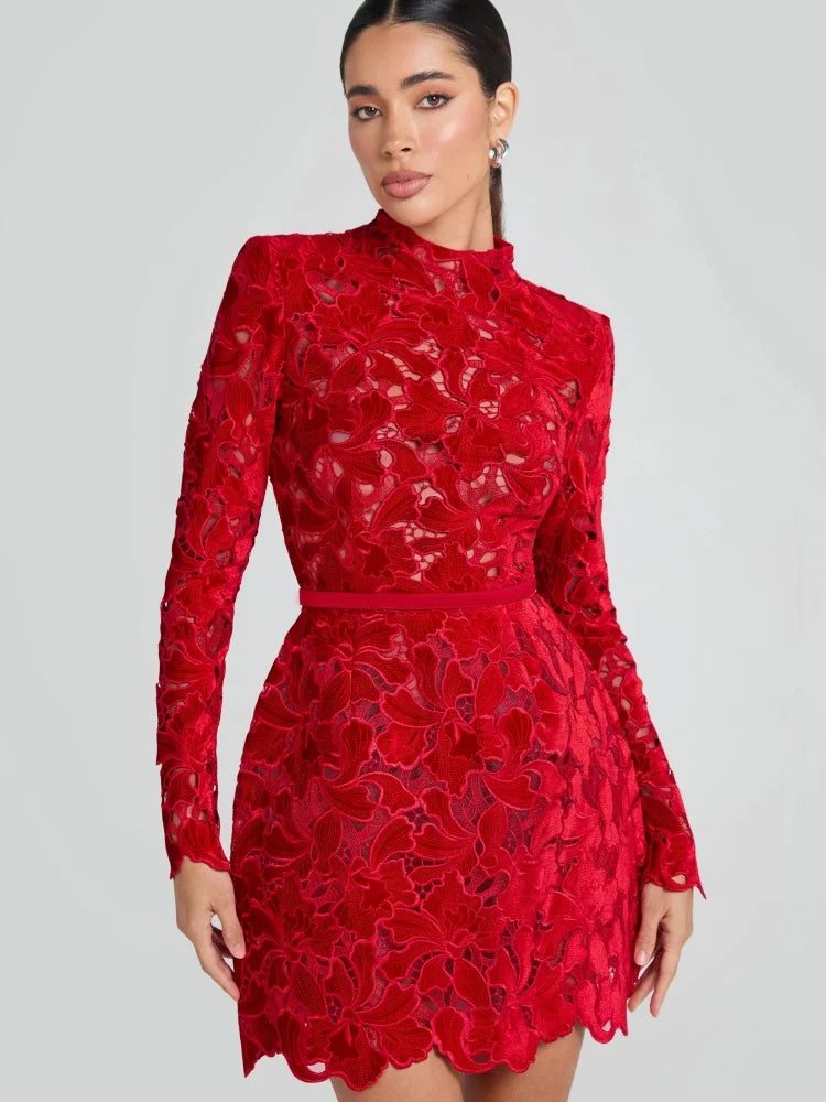Red lace dress worn by a model , Obroi
