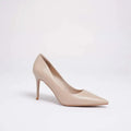 A single light beige pointed-toe high heel pump photographed on a clean white studio background, Obroi
