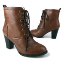 Brown lace-up boots with black soles on a white background, Obroi