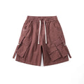 Brown cargo shorts with multiple pockets on a white background, Obroi